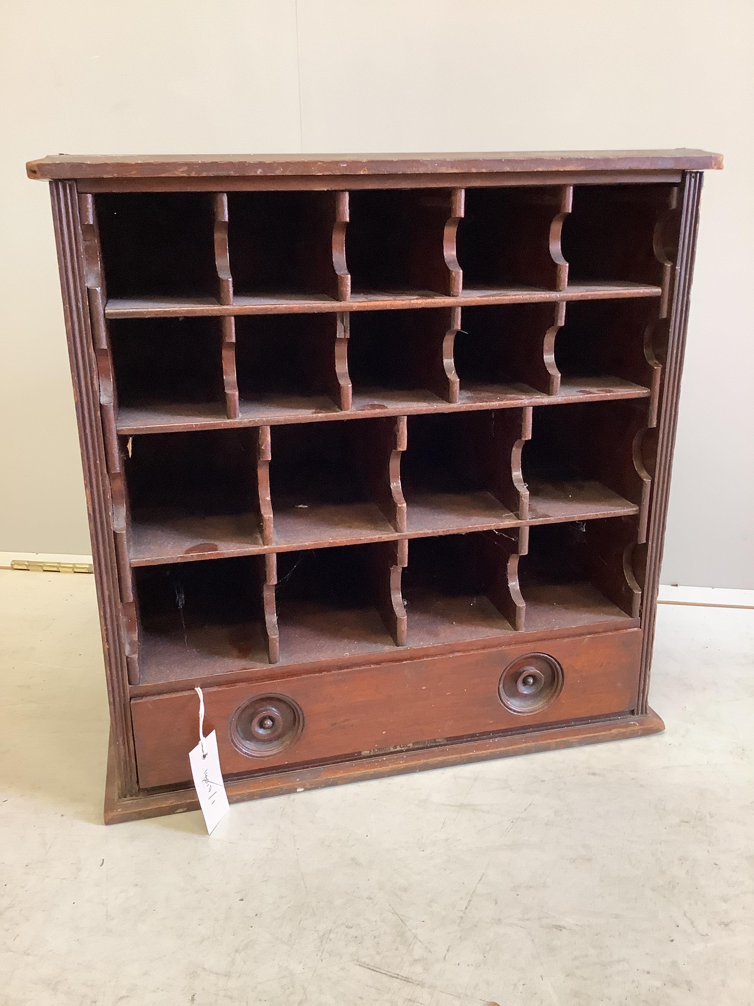 A Victorian Ferris & Co Bristol mahogany pigeonhole dispensing cabinet with compartmented drawer, width 48cm, depth 26cm, height 49cm